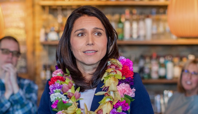 Representative Tulsi Gabbard, a Democrat from Hawaii and 2020 presidential candidate, pauses while speaking to attendees during a campaign stop in Portsmouth, New Hampshire, U.S., on Sunday, Feb. 17, 2019.