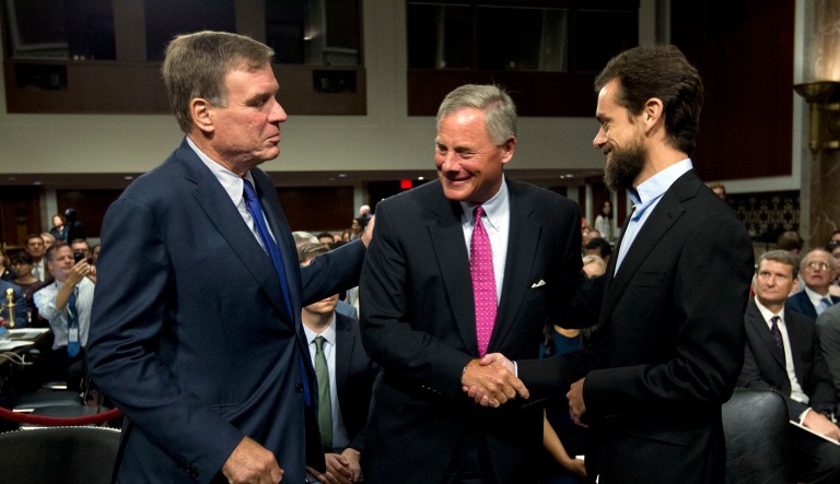 Senate Intelligence Committee Vice Chairman Mark Warner, D-Va., left, and Chairman Sen. Richard Burr, R-N.C., center, greet Twitter CEO Jack Dorsey before he testifies before the Senate Intelligence Committee hearing on 'Foreign Influence Operations and Their Use of Social Media Platforms' on Capitol Hill, Wednesday, Sept. 5, 2018, in Washington.