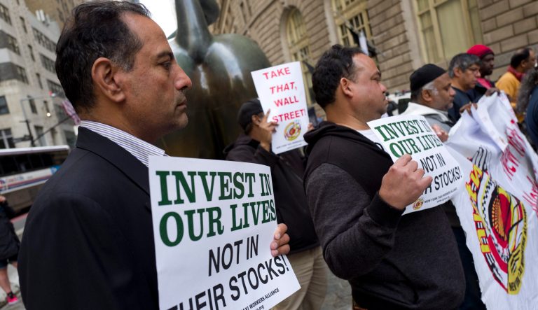 Uber drivers protest in New York's financial district, Wednesday, May 8, 2019.