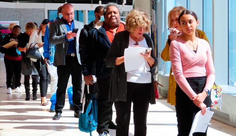 Applicants line up at a job fair at the Ocean Casino Resort in Atlantic City N.J., on April 11, 2022. Applications for jobless aid for the week ending July 9 rose by 9,000 to 244,000, up from the previous week's 235,000, the Labor Department reported Thursday, July 14, 2022. First-time applications generally reflect layoffs. Analysts had expected the number to remain flat from the previous week.