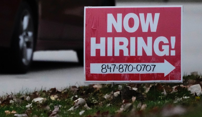 Job openings report. JOLTS report. A hiring sign is displayed in Wheeling, Ill., Tuesday, Nov. 7, 2023.