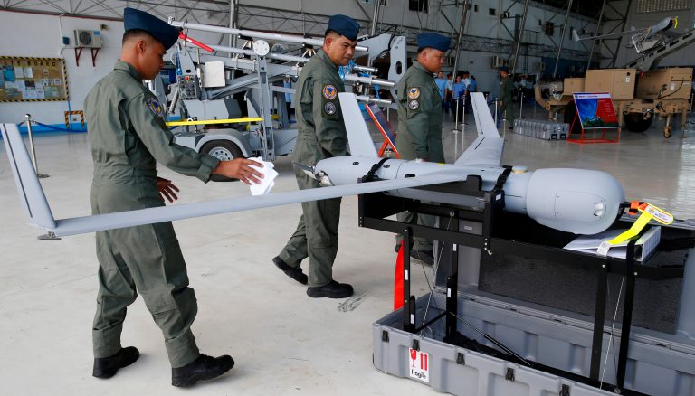 Philippine Air Force personnel wipes off the champagne on an ScanEagle Unmanned Aerial Vehicles following its turnover Tuesday, March 13, 2018 at Villamor Air Base in suburban Pasay city southeast of Manila, Philippines. Six drones were acquired by the Philippine Air Force from the United States for $13.76 million and will be used for counter-terrorism, security operations, maritime patrol and disaster response operations, especially in assessing extent of damage caused by disasters and calamities and locating victims and survivors.
