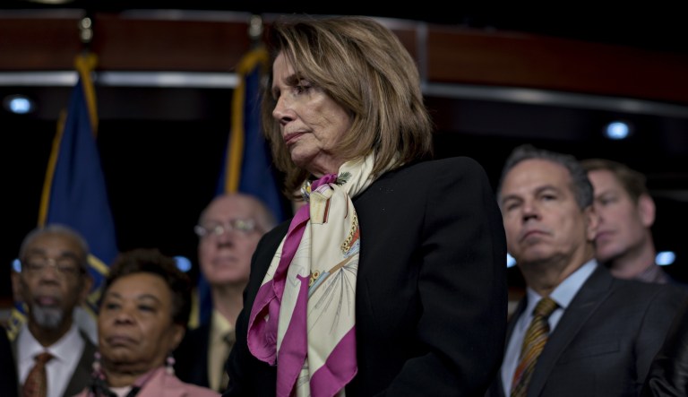 House Minority Leader Nancy Pelosi, a Democrat from California, listens during a news conference on Capitol Hill in Washington, D.C., on Saturday, Jan. 20, 2018.