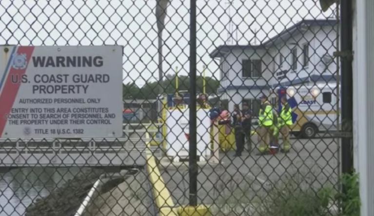 A person making a radio distress call to the Coast Guard from a dive boat on fire off California said that he couldn't breathe and there were people trapped on board. 