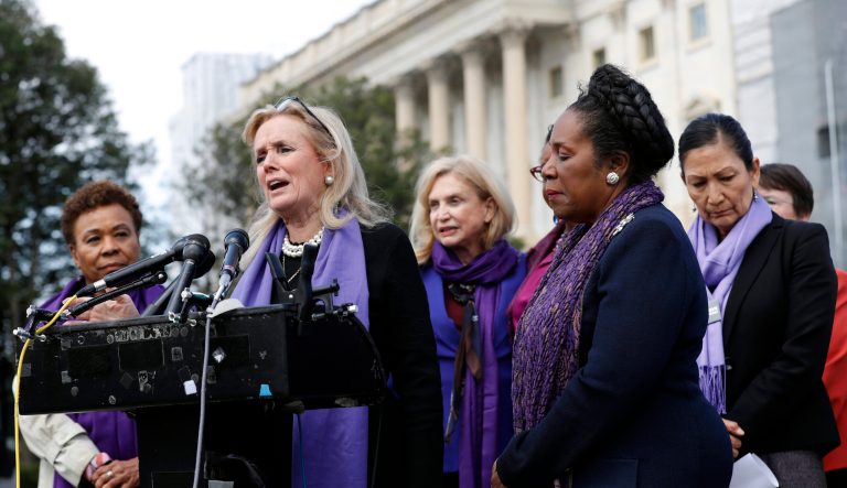Rep. Debbie Dingell, D-Mich., speaks as Rep. Barbara Lee, D-Calif., left, and Rep. Sheila Jackson Lee, D-Texas, second from right, listen at a news conference after the House voted to reauthorize the Violence Against Women Act, Thursday, April 4, 2019, on Capitol Hill in Washington. At right is Rep. Deb Haaland, D-N.M. 