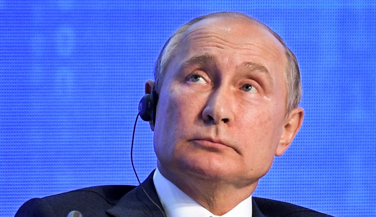 Russian President Vladimir Putin attends the 2019 Russian Energy Week forum in Moscow, Russia, Wednesday, Oct. 2, 2019. 
