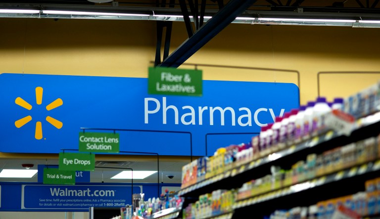 The pharmacy department at Wal-Mart Neighborhood Market in Bentonville, Ark., is shown Thursday June 5, 2014.