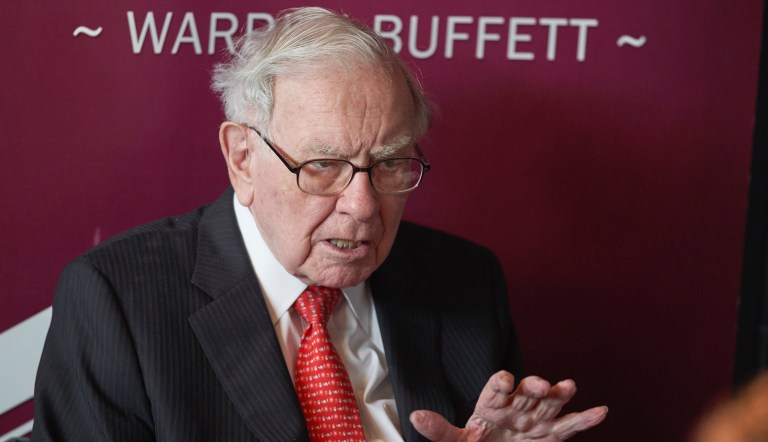 Warren Buffett, Chairman and CEO of Berkshire Hathaway, smiles as he plays bridge following the annual Berkshire Hathaway shareholders meeting in Omaha, Neb., Sunday, May 5, 2019. 