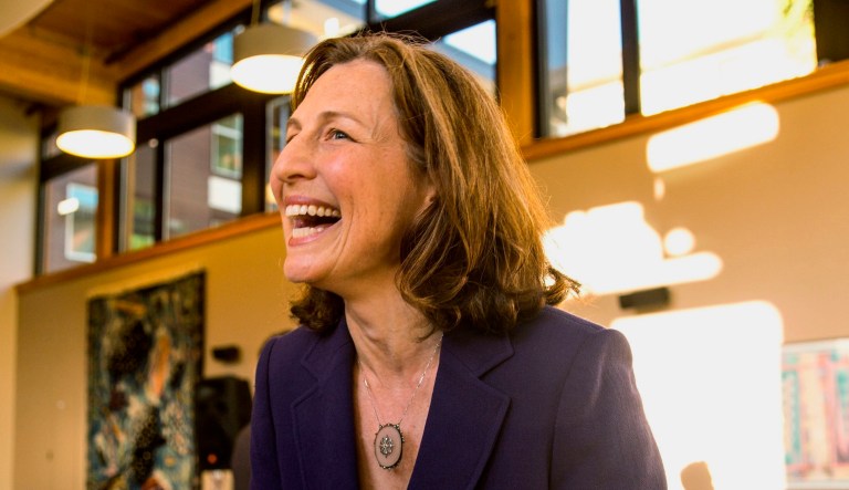 Kim Schrier, Democratic candidate for Washington state's 8th Congressional District, speaks to reporters at the YWCA in Issaquah on Aug. 7, 2018.