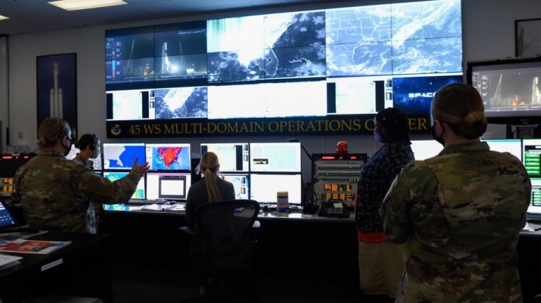45th Weather Squadron Airmen discuss launch operations at Cape Canaveral Air Force Station, Florida, June 13, 2020. 
