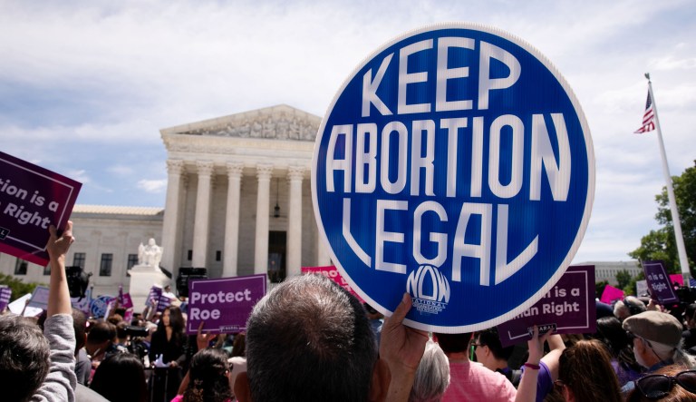 Abortion-rights activists rally at the Supreme Court in Washington.