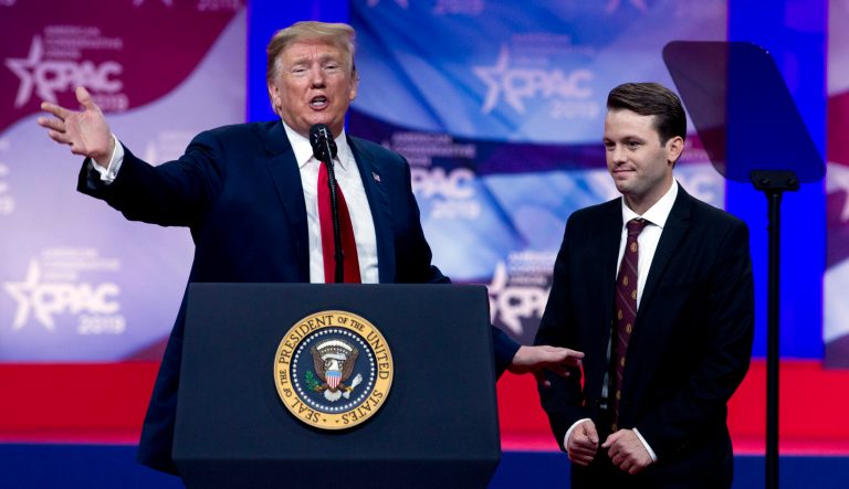 President Donald Trump invites to the podium Hayden Williams, a field representative of the Leadership Institute, who was assaulted at Berkeley campus to speak at Conservative Political Action Conference, CPAC 2019, in Oxon Hill, Md., Saturday, March 2, 2019. 