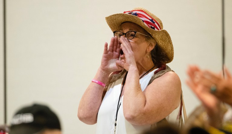 An attendee cheers during a Women For Trump campaign rally for President Donald Trump in King of Prussia, Pa., Tuesday, July 16, 2019. 
