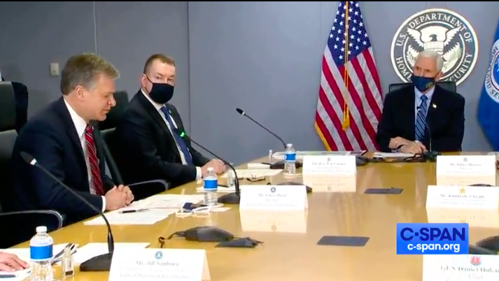 FBI Director Christopher Wray briefs Vice President Mike Pence at FEMA Headquarters.