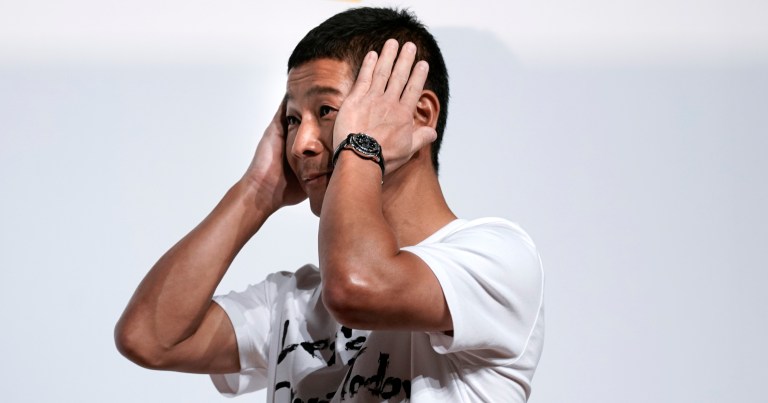 Zozo founder, Yusaku Maezawa, gets emotional as he speaks during a news conference Thursday, Sept. 12, 2019, in Tokyo. 