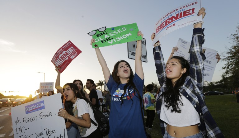 Supporters of Democratic presidential candidate, Sen. Bernie Sanders, I-Vt, line the streets outside Miami-Dade College before the Univision, Washington Post Democratic presidential debate,  Wednesday, March 9, 2016, in Miami.