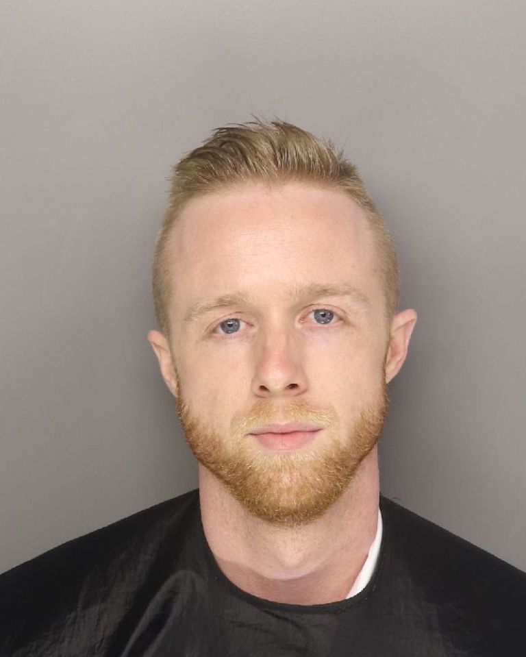 A mugshot of Zachary David Hughes.