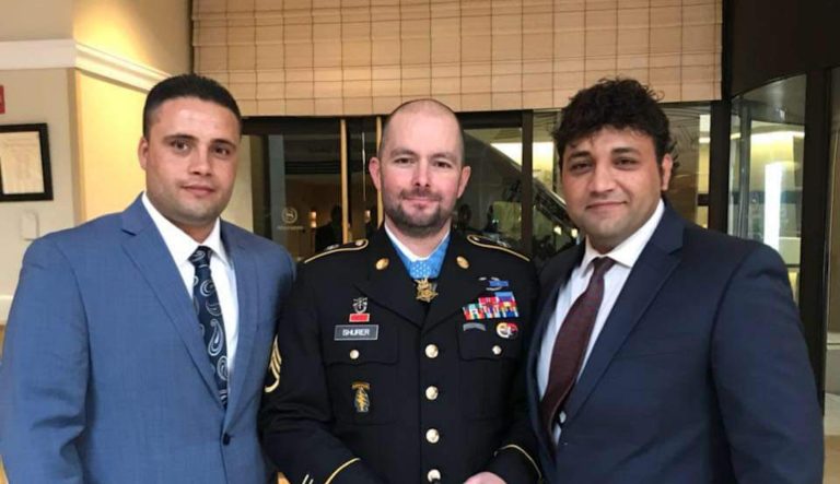 Zia Ghafoori (left) served as an interpreter for Medal of Honor recipient SSG Ronald Shurer (center). Courtesy of No One Left Behind.