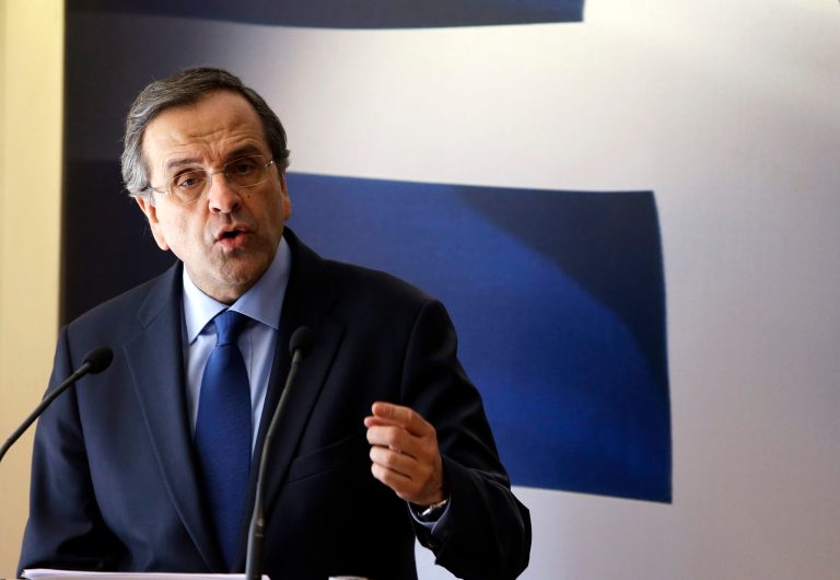 Greece reaches long-delayed deal on bailout loans