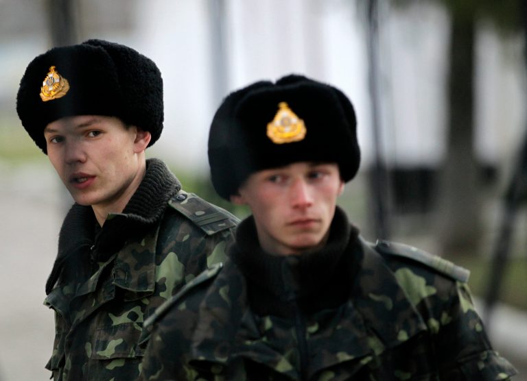 At Ukrainian base, standoff turns into circus