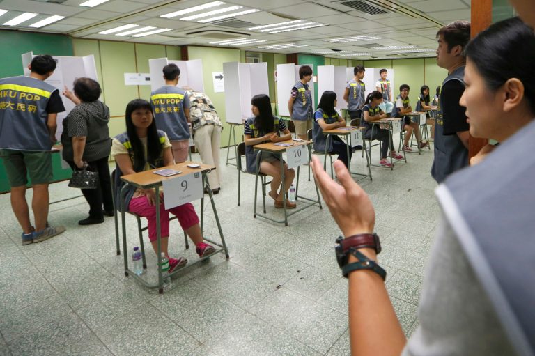 Big turnout in HK democracy vote as Beijing fumes