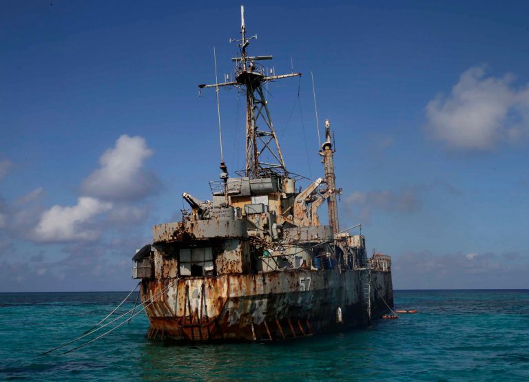 Old US ship home to Filipinos in China standoff