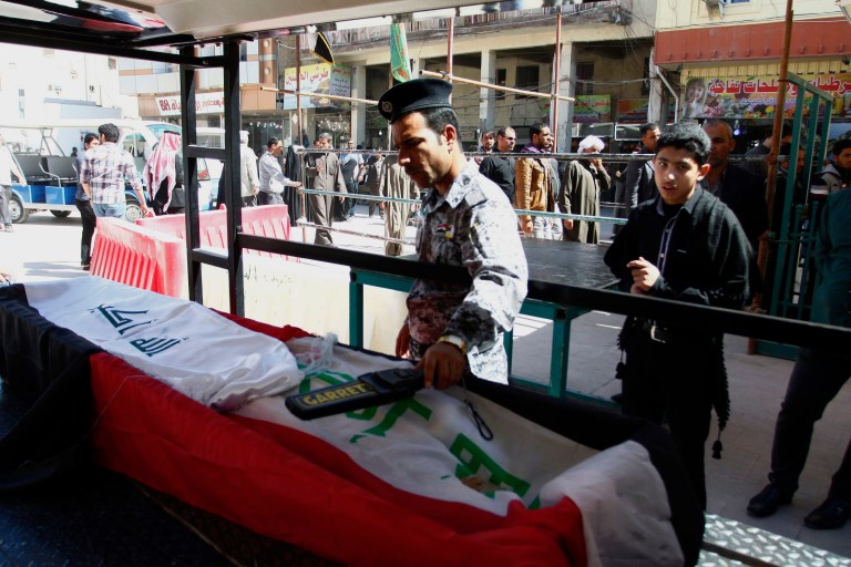 Suicide attack at cafe in Iraqi capital kills 12