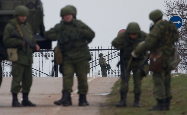 Obama warns Russia over military moves in Crimea