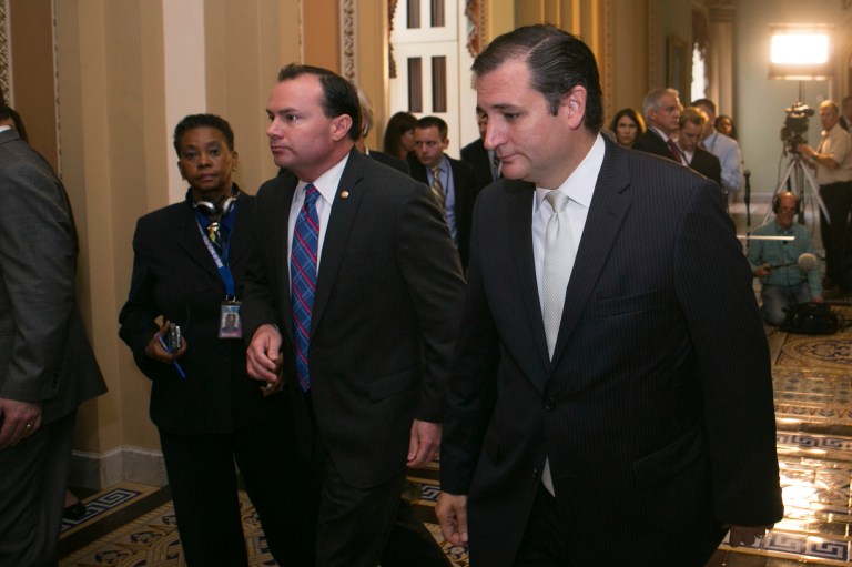 Senate OKs spending bill, funds Obamacare as fight moves to House