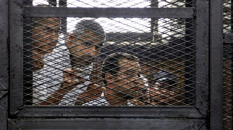 Outcry after Egypt sentences 3 reporters to prison