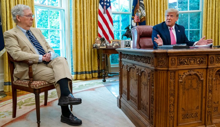 Senate Majority Leader Mitch McConnell (R-KY) listens as President Donald Trump speaks during a meeting in the Oval Office of the White House, July 20, 2020, in Washington. (AP Photo/Evan Vucci, File)