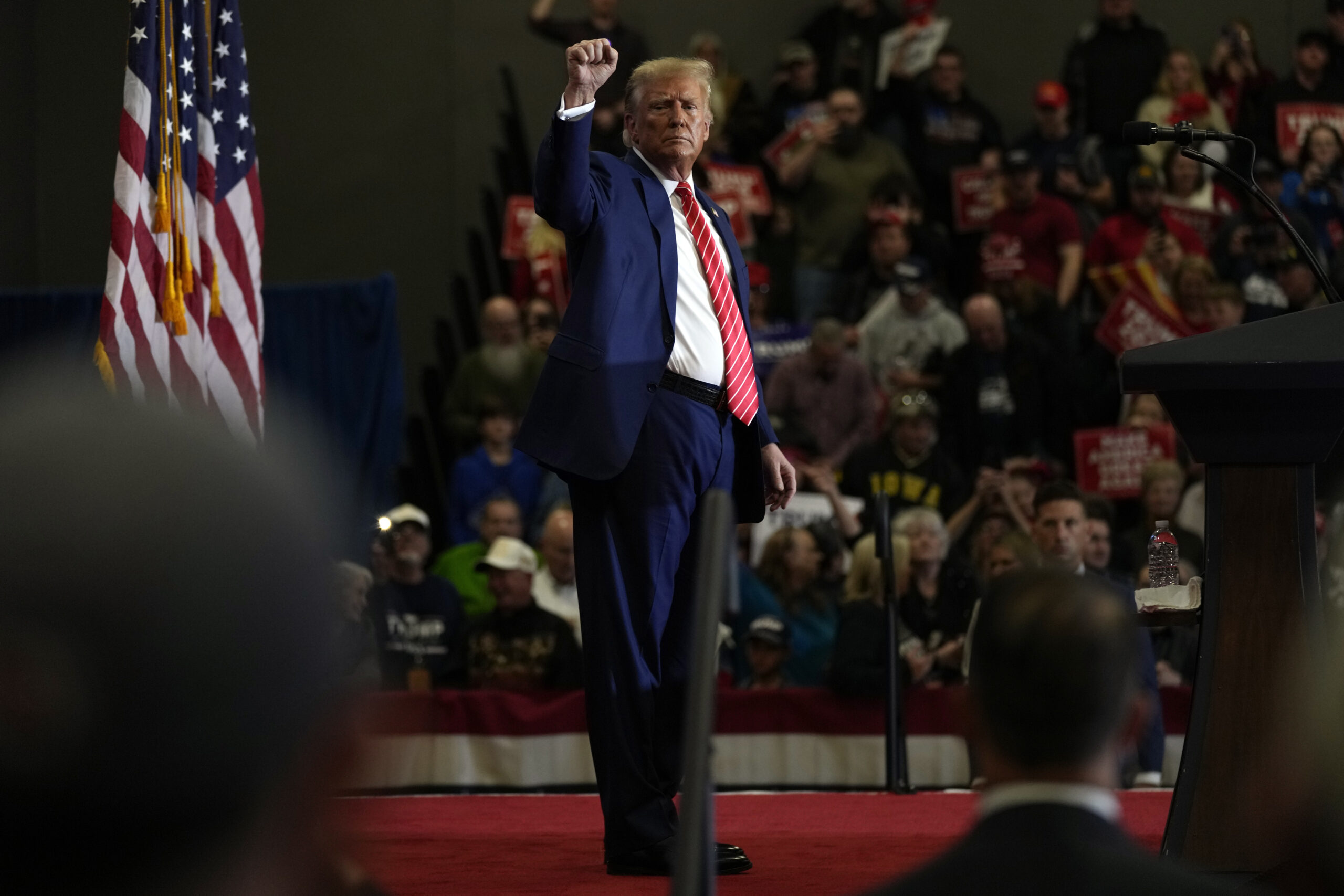 Trump woos GOP crowds in Iowa but pushes some toward his opponents