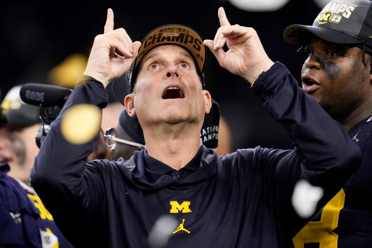 Harbaugh returning to NFL to coach Chargers after leading Michigan to national title, AP sources say