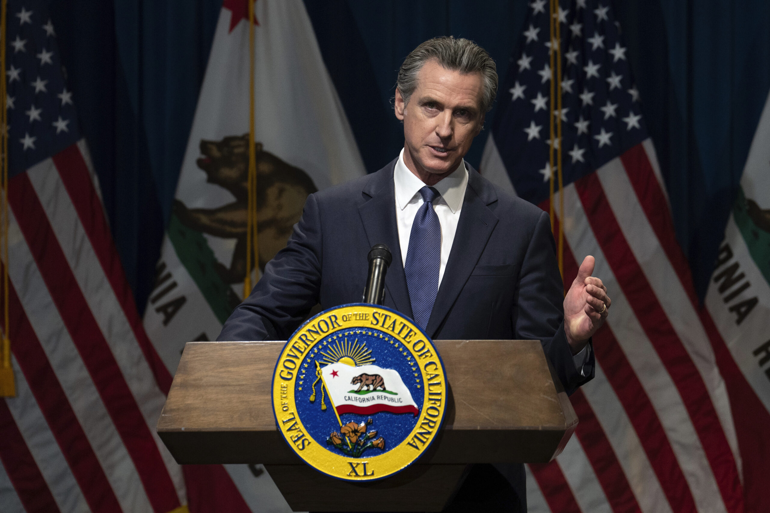 Gavin Newsom takes aim at his own party after dodging question on replacing Biden