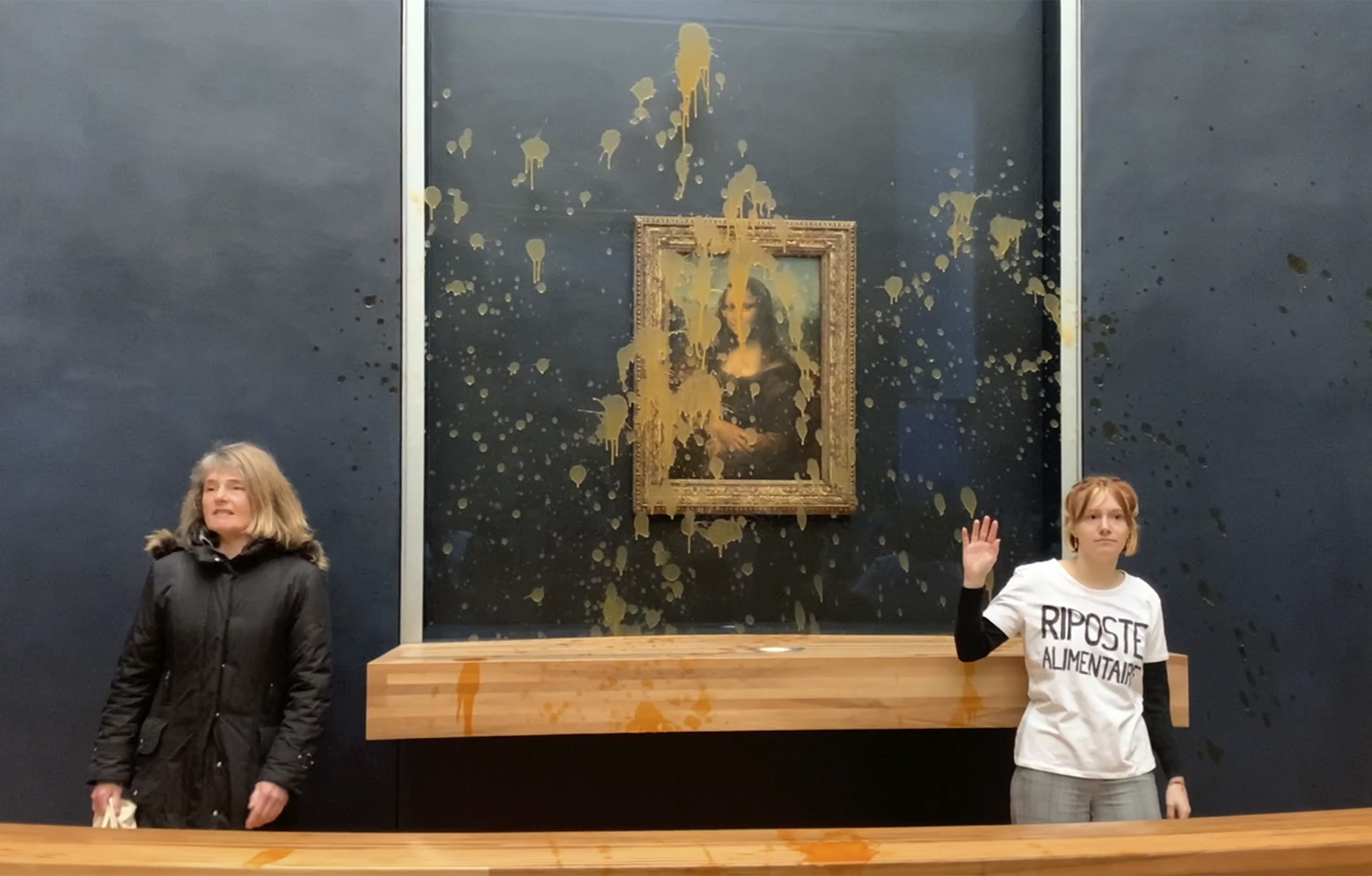 Hunger activists throw soup onto ‘Mona Lisa’ in Paris museum