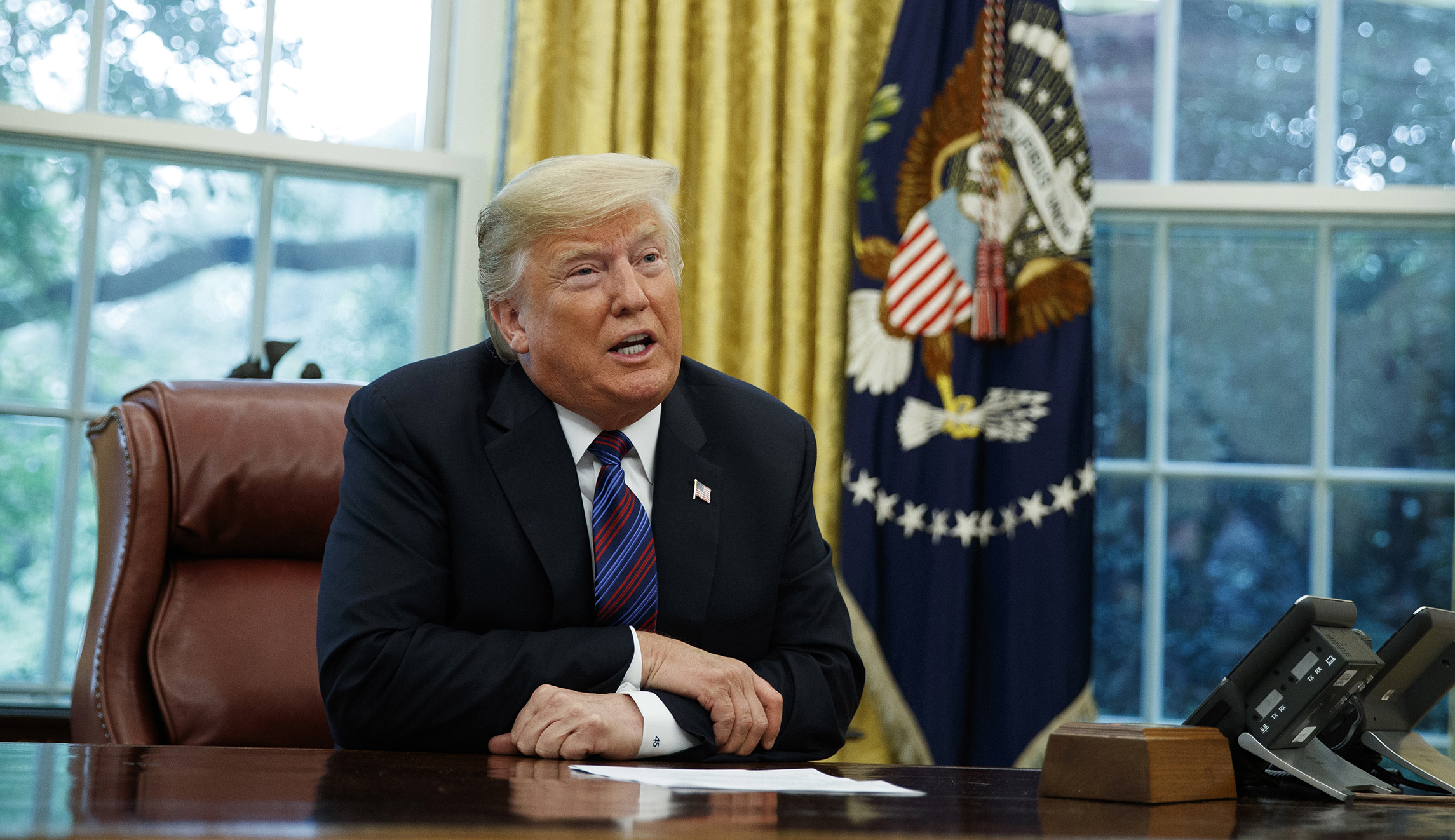 Trump calls for tougher libel laws after Woodward book