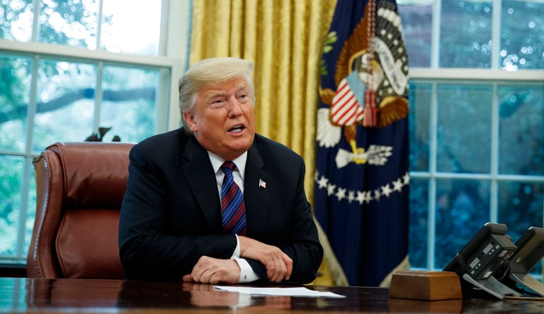 Trump calls for tougher libel laws after Woodward book