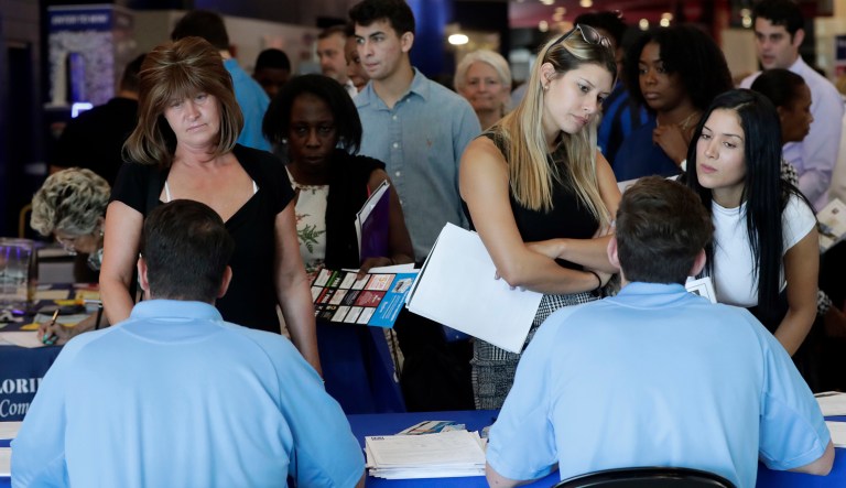 Jobless claims plunge to 214,000, lowest since May