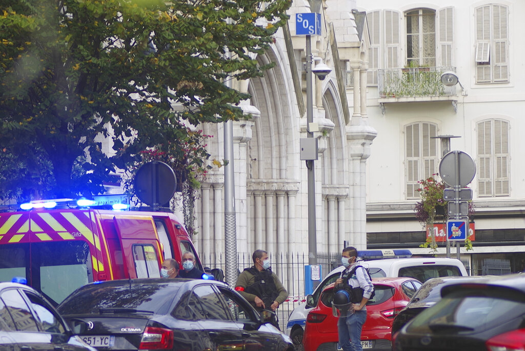 Woman decapitated and two more killed outside French church in suspected terrorism attack