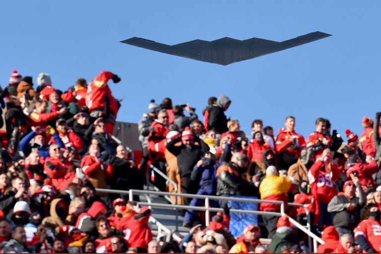 FILE - A B-2 bomber flies over spectators at Arrowhead Stadium before the AFC Championship Game between the Kansas City Chiefs and the Tennessee Titans on Jan. 19, 2020, in Kansas City, Missouri.