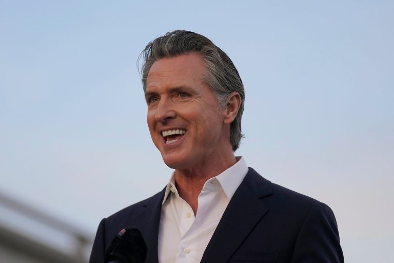 California Gov. Gavin Newsom speaks during an event in San Francisco in November. California on Monday became the first U.S. state to offer comprehensive health insurance to all undocumented immigrants, a plan expected to expand to roughly 700,000 residents living in the Golden State. (AP Photo/Jeff Chiu)