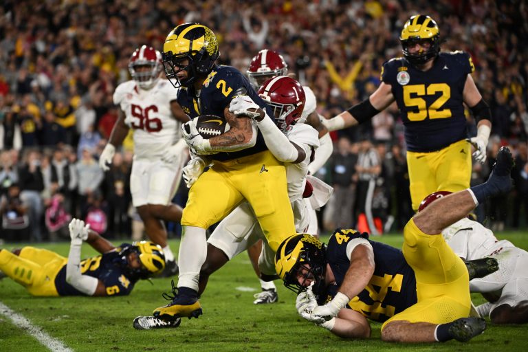 Michigan beats Alabama 27-20 in overtime on Blake Corum’s TD run to reach national title game