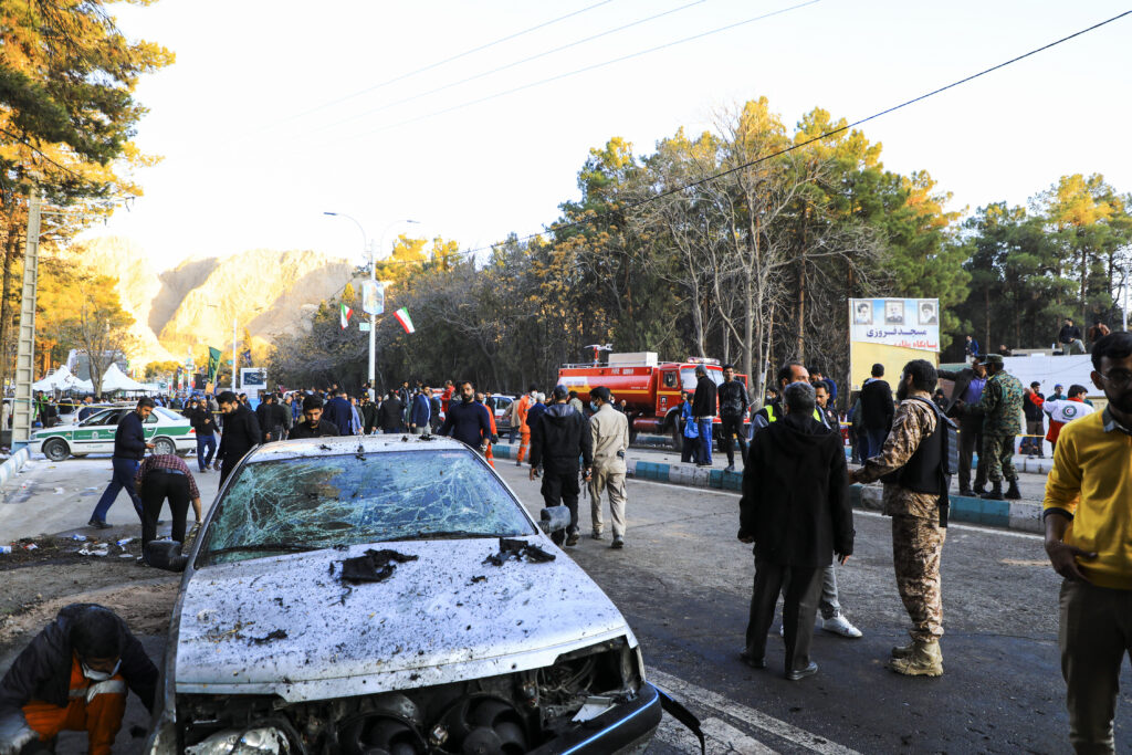 People gather at the site of an explosion in the city of Kerman, about 510 miles southeast of the capital Tehran, Iran, on Wednesday, Jan. 3, 2024. Two bombs exploded Wednesday at a commemoration for a prominent Iranian general slain by the U.S. in a 2020 drone strike, Iranian officials said, as the Middle East remains on edge over Israel's war on Hamas in the Gaza Strip.