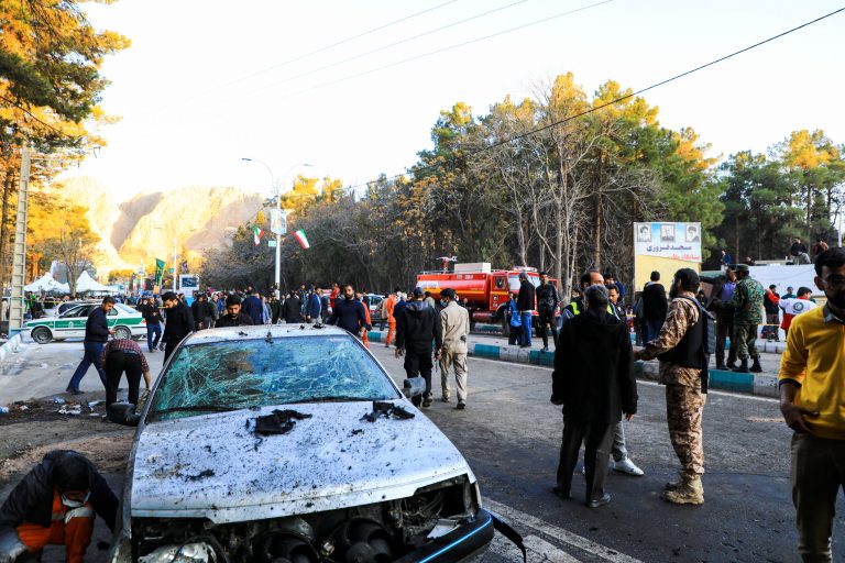 People gather at the site of an explosion in the city of Kerman, about 510 miles southeast of the capital Tehran, Iran, on Wednesday, Jan. 3, 2024. Two bombs exploded Wednesday at a commemoration for a prominent Iranian general slain by the U.S. in a 2020 drone strike, Iranian officials said, as the Middle East remains on edge over Israel's war on Hamas in the Gaza Strip.