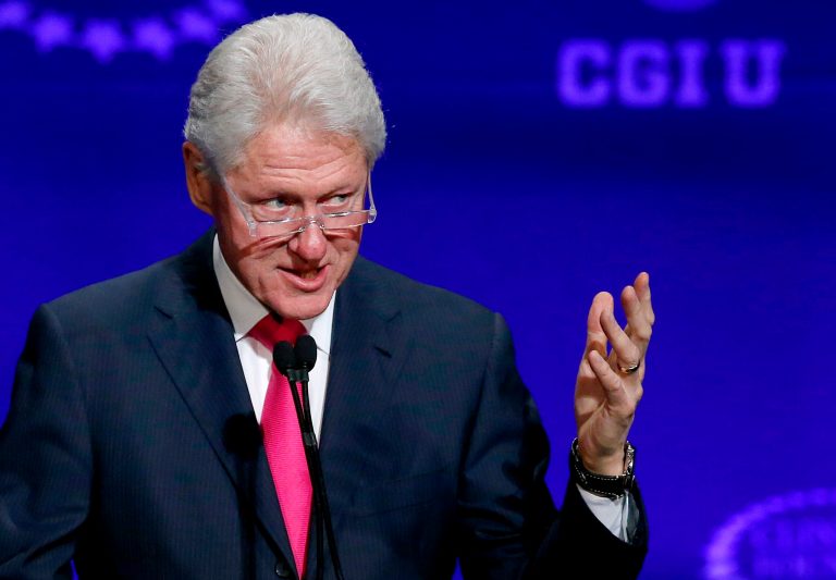 Clinton says nation needs gradual debt reduction