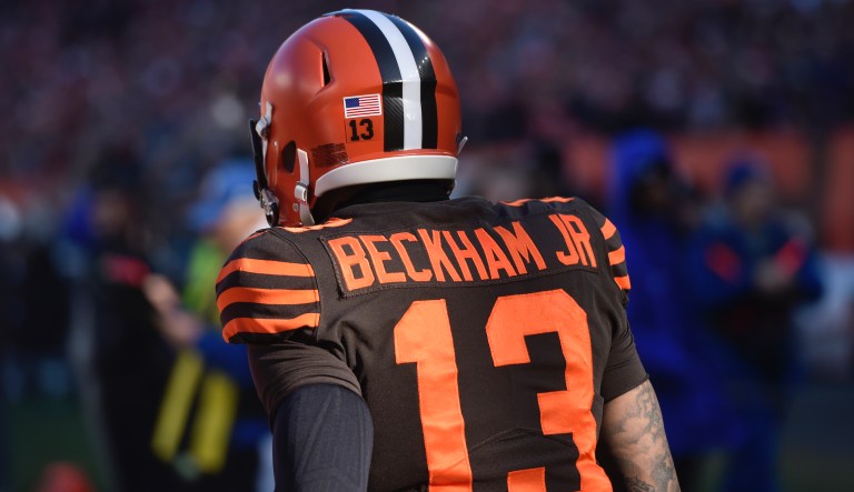 VIDEO: NFL star slapped with arrest warrant after spanking police officer on the rear