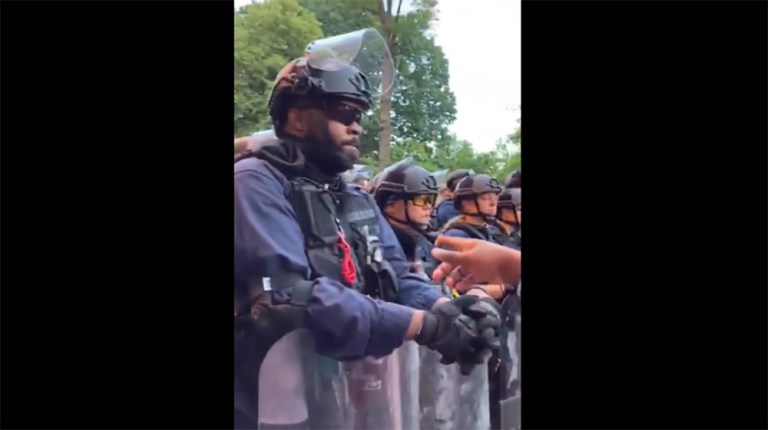 ‘Their blue line matters more’: A black man pleads for recognition by black officers at DC protest