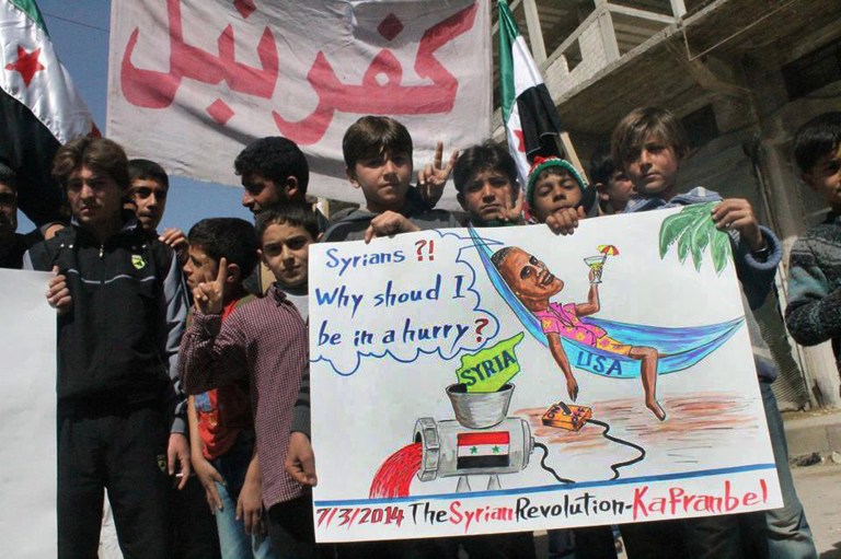 Syrian forces wrest border town from rebels