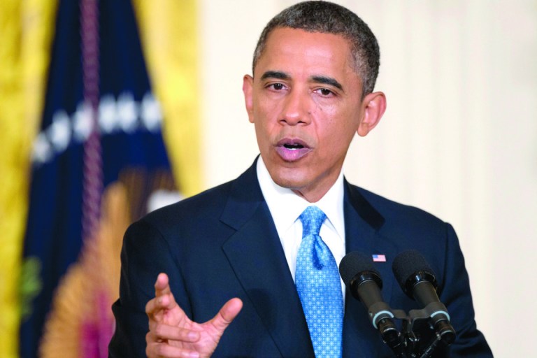 Obama pledges not to give in on debt limit fight