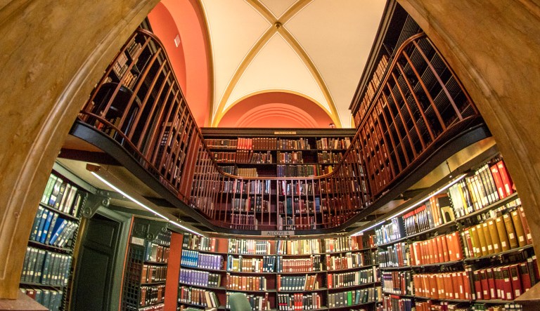 Shelves of books are seen in the Library of Congress Jefferson Building.